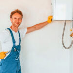 professional troubleshooting an inefficient water heater 1